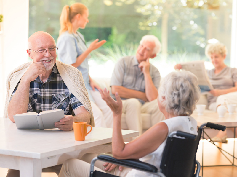 a group of people sitting at a table